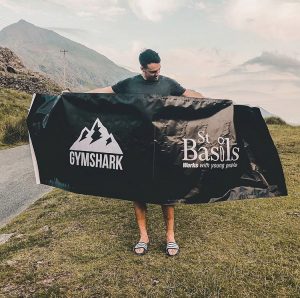 Gymshark hold up St Basils banner