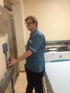 Chris at work as a health care assistant